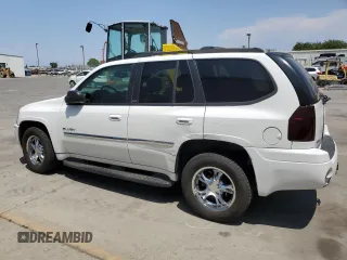 2006 GMC Envoy SLE z VIN 1GKDT13S762345183, wystawiony jako Copart lot #60096645 z przebiegiem 249 658 mil mil oraz Szkoda całkowita • Salvage title. Historia ofert i sprzedaży dostępna na DreamBid. Obrazek 2.