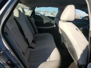 2023 Hyundai Sonata Hybrid Blue with VIN KMHL24JJ6PA060385, listed as a Copart auction lot 80527644 with 76,173 mi miles and Salvage Title. Bid and sale history available at carsss.com. Image 10.