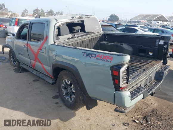 2022 Toyota Tacoma SR with VIN 3TYCZ5AN2NT096491, listed as a IAAI auction lot 42093897 with 47,041 mi miles and . Bid and sale history available at DreamBid. Image 3.