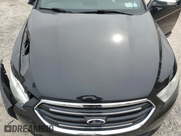 2013 Ford Taurus Limited with VIN 1FAHP2F89DG131731, listed as a Copart auction lot 48609065 with 116,975 mi miles and Salvage title. Bid and sale history available at DreamBid. Image 13.