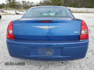 2009 Chrysler 300 LX with VIN 2C3KA43D29H581073, listed as a Copart auction lot 48702345 with 142,917 mi miles and Salvage Title. Bid and sale history available at carsss.com. Image 6.