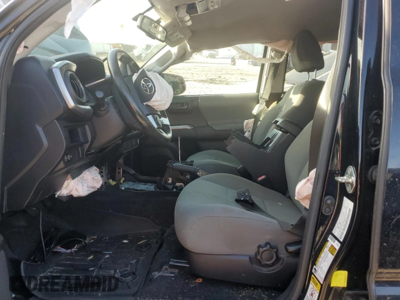 2017 Toyota Tacoma SR5 z VIN 3TMDZ5BN2HM026640, wystawiony jako Copart lot #76337144 z przebiegiem Nie podano mil oraz Szkoda całkowita • Salvage title. Historia ofert i sprzedaży dostępna na DreamBid. Obrazek 7.