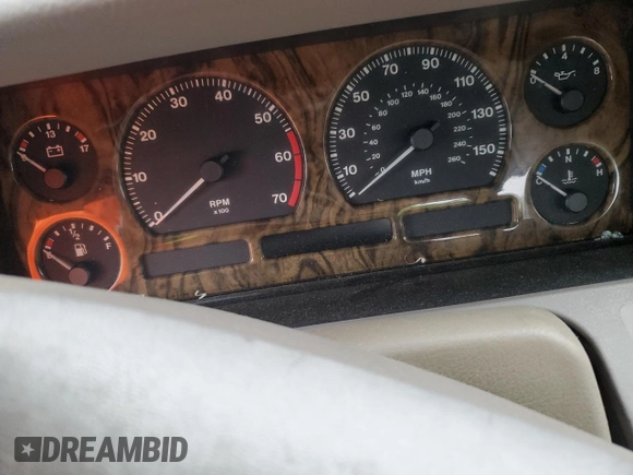 1995 Jaguar XJ with VIN SAJHX174XSC738856, listed as a Copart auction lot 57768915 with Not provided miles and Salvage title. Bid and sale history available at DreamBid. Image 9.