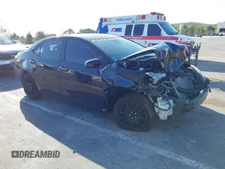 2018 Toyota Corolla L z VIN 5YFBURHE6JP761043, wystawiony jako IAAI lot #41707653 z przebiegiem 69 118 mil mil oraz . Historia ofert i sprzedaży dostępna na DreamBid. Obrazek 1.