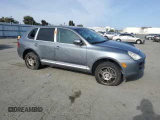 2005 Porsche Cayenne z VIN WP1AA29P65LA23655, wystawiony jako Copart lot #55174175 z przebiegiem 153 837 mil mil oraz Szkoda całkowita • Salvage title. Historia ofert i sprzedaży dostępna na DreamBid. Obrazek 4.