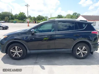 2016 Toyota RAV4 XLE with VIN 2T3WFREV4GW294428, listed as a IAAI auction lot 39168618 with 115,791 mi miles. Bid and sale history available at carsss.com. Image 14.