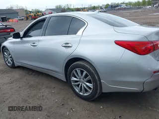 2015 Infiniti Q50 Premium z VIN JN1BV7AR8FM390785, wystawiony jako IAAI lot #42200437 z przebiegiem 94 841 mil mil oraz . Historia ofert i sprzedaży dostępna na DreamBid. Obrazek 14.