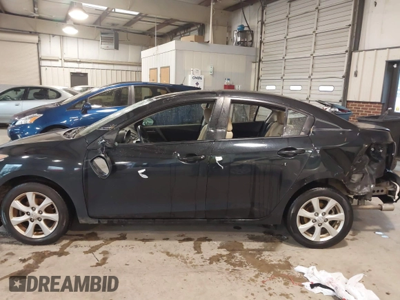 2010 Mazda Mazda3 i Touring with VIN JM1BL1SF3A1217495, listed as a IAAI auction lot 41054214 with 189,147 mi miles. Bid and sale history available at carsss.com. Image 14.