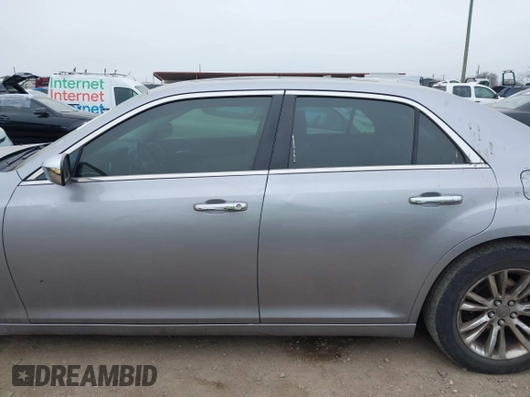 2015 Chrysler 300 C with VIN 2C3CCAEG0FH779540, listed as a IAAI auction lot 41542982 with 211,348 mi miles and . Bid and sale history available at carsss.com. Image 14.