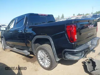 2019 GMC Sierra 1500 Denali z VIN 1GTU9FEL8KZ173809, wystawiony jako IAAI lot #42363300 z przebiegiem 75 425 mil mil oraz . Historia ofert i sprzedaży dostępna na DreamBid. Obrazek 3.