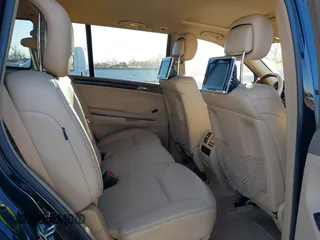 2012 Mercedes-Benz GL 350 with VIN 4JGBF2FE9CA789183, listed as a IAAI auction lot 41424031 with 158,432 mi miles and . Bid and sale history available at DreamBid. Image 8.