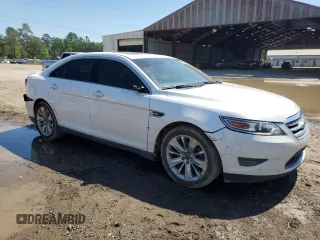 2011 Ford Taurus Limited with VIN 1FAHP2FW8BG141839, listed as a Copart auction lot 56594285 with 121,236 mi miles and Salvage title. Bid and sale history available at DreamBid. Image 4.