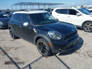 2014 MINI Countryman S z VIN WMWZC3C50EWP51835, wystawiony jako IAAI lot #42338211 z przebiegiem 137 371 mil mil oraz . Historia ofert i sprzedaży dostępna na DreamBid. Obrazek 1.