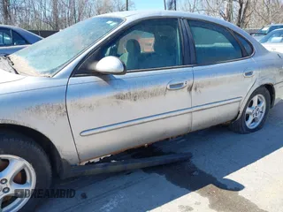 2003 Ford Taurus SE Standard with VIN 1FAFP53U53G226439, listed as a IAAI auction lot 41845541 with 215,870 mi miles. Bid and sale history available at carsss.com. Image 6.