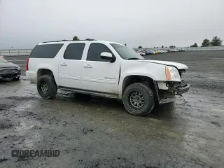 2013 GMC Yukon XL SLT z VIN 1GKS2KE74DR127036, wystawiony jako Copart lot #46916615 z przebiegiem 211 043 mil mil oraz Szkoda całkowita • Salvage title. Historia ofert i sprzedaży dostępna na DreamBid. Obrazek 11.