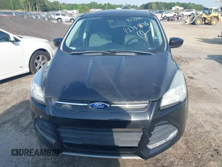 2013 Ford Escape SE with VIN 1FMCU9GX1DUC40662, listed as a IAAI auction lot 42158818 with 115,953 mi miles and . Bid and sale history available at DreamBid. Image 6.