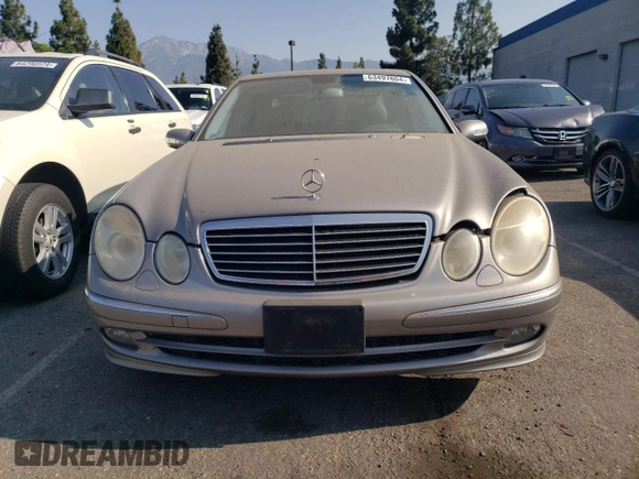 2005 Mercedes-Benz E 5.0L with VIN WDBUF70J75A693702, listed as a Copart auction lot 63497604 with 122,410 mi miles and Clean Title. Bid and sale history available at carsss.com. Image 5.