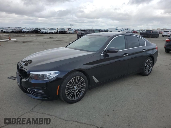 2018 BMW 5 Series 530i with VIN WBAJA5C51JWA38499, listed as a Copart auction lot 49150205 with 59,521 mi miles and Salvage Title. Bid and sale history available at DreamBid. Image 1.