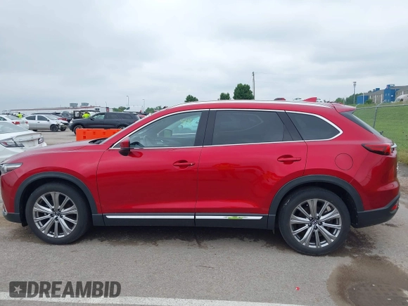 2021 Mazda CX-9 Signature with VIN JM3TCBEY9M0511928, listed as a IAAI auction lot 42231925 with 26,367 mi miles and . Bid and sale history available at DreamBid. Image 14.