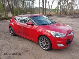 2012 Hyundai Veloster w/Gray Int z VIN KMHTC6AD3CU022866, wystawiony jako IAAI lot #41847285 z przebiegiem 199 487 mil mil oraz . Historia ofert i sprzedaży dostępna na DreamBid. Obrazek 1.