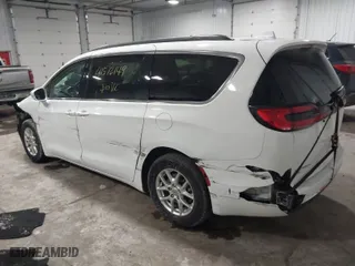 2022 Chrysler Pacifica Touring L with VIN 2C4RC1BG3NR178111, listed as a IAAI auction lot 41572149 with 54,919 mi miles. Bid and sale history available at carsss.com. Image 3.