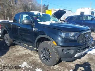 2023 Ford Ranger XL with VIN 1FTER1FH5PLE23308, listed as a IAAI auction lot 41613871 with 18932 miles. Bid and sale history available at carsss.com. Image 1.