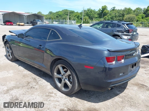 2013 Chevrolet Camaro LT with VIN 2G1FC1E38D9160609, listed as a IAAI auction lot 42646283 with 215,814 mi miles and . Bid and sale history available at DreamBid. Image 3.