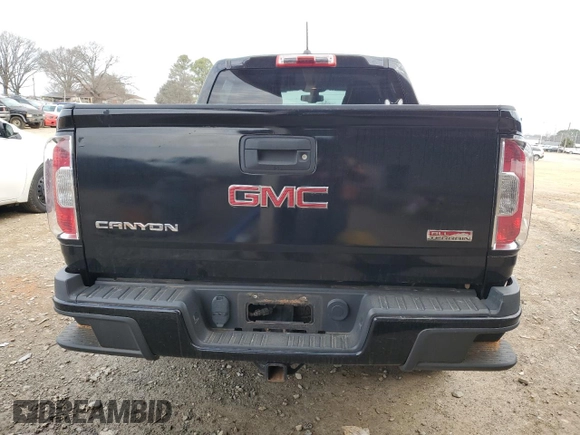 2015 GMC Canyon 4WD SLE with VIN 1GTG6BE38F1140912, listed as a Copart auction lot 44330565 with 102,809 mi miles and Salvage Title. Bid and sale history available at carsss.com. Image 6.