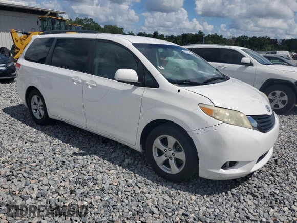 2011 Toyota Sienna LE AAS with VIN 5TDKK3DC9BS100400, listed as a Copart auction lot 62060125 with 210,274 mi miles and Salvage title. Bid and sale history available at DreamBid. Image 4.