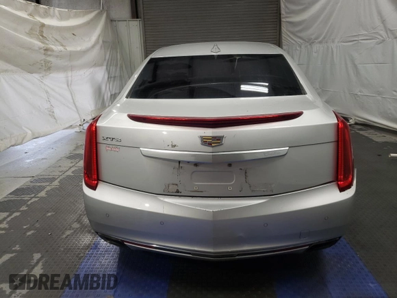 2017 Cadillac XTS Luxury z VIN 2G61M5S36H9143617, wystawiony jako Copart lot #56287985 z przebiegiem 159 542 mil mil oraz Czysty tytuł • Clean title. Historia ofert i sprzedaży dostępna na DreamBid. Obrazek 6.