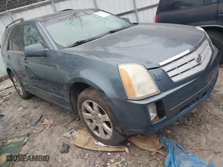 2006 Cadillac SRX with VIN 1GYEE637X60204875, listed as a IAAI auction lot 41350134 with 179,890 mi miles. Bid and sale history available at carsss.com. Image 1.