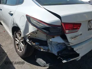 2017 Kia Optima LX with VIN 5XXGT4L32HG156781, listed as a IAAI auction lot 42044826 with 295,162 mi miles and . Bid and sale history available at carsss.com. Image 18.
