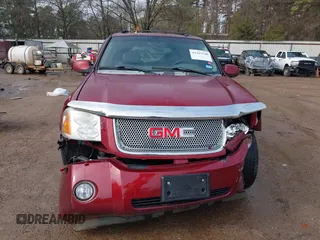 2007 GMC Envoy Denali with VIN 1GKES63M472162363, listed as a IAAI auction lot 41247540 with 237,356 mi miles. Bid and sale history available at carsss.com. Image 6.