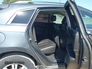 2012 Cadillac SRX with VIN 3GYFNGE32CS546815, listed as a IAAI auction lot 42014765 with 142,373 mi miles. Bid and sale history available at carsss.com. Image 8.