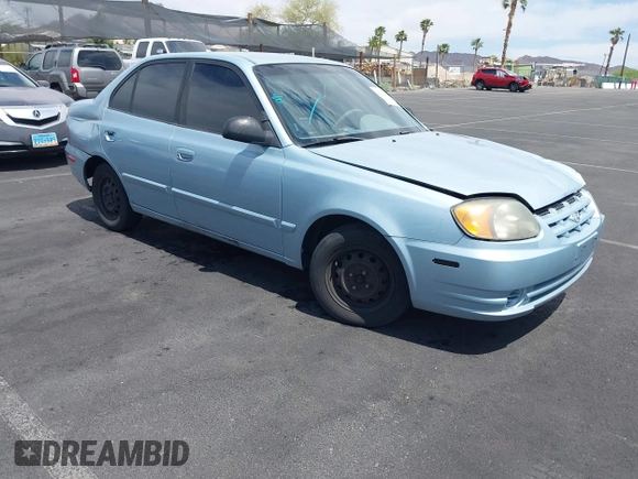 2005 Hyundai Accent GLS z VIN KMHCG45C85U591452, wystawiony jako IAAI lot #42114303 z przebiegiem 173 832 mil mil oraz . Historia ofert i sprzedaży dostępna na DreamBid. Obrazek 1.