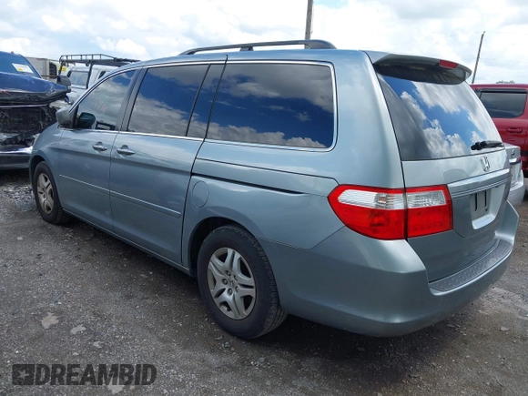 2007 Honda Odyssey EX-L with VIN 5FNRL38747B121059, listed as a IAAI auction lot 42211056 with 171,838 mi miles and . Bid and sale history available at DreamBid. Image 3.