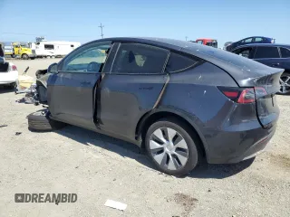 2024 Tesla Model Y Long Range z VIN 7SAYGDEE6RF032348, wystawiony jako Copart lot #58158355 z przebiegiem Nie podano mil oraz Szkoda całkowita • Salvage title. Historia ofert i sprzedaży dostępna na DreamBid. Obrazek 2.