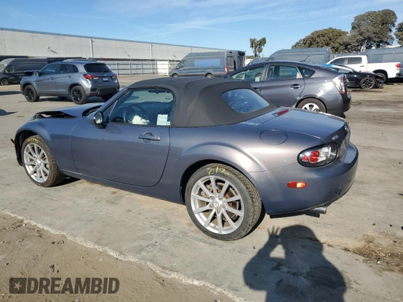 2006 Mazda MX-5 Miata Sport z VIN JM1NC25F260115830, wystawiony jako Copart lot #76844774 z przebiegiem 52 599 mil mil oraz Szkoda całkowita • Salvage title. Historia ofert i sprzedaży dostępna na DreamBid. Obrazek 2.