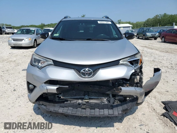 2016 Toyota RAV4 SE with VIN 2T3JFREV4GW531364, listed as a Copart auction lot 60031585 with 147,741 mi miles and Salvage title. Bid and sale history available at DreamBid. Image 5.