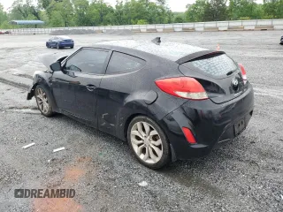 2013 Hyundai Veloster w/Gray Int с VIN KMHTC6AD8DU113990, выставлен на аукционе Copart как лот 54571895 с пробегом 181 757 миль миль и Списание • Salvage title. История ставок и продаж доступна на DreamBid. Изображение 2.