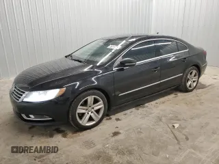 2014 Volkswagen CC Sport with VIN WVWBP7AN0EE527828, listed as a Copart auction lot 87822445 with 113,006 mi miles and Clean Title. Bid and sale history available at carsss.com. Image 1.