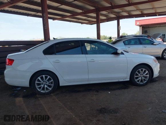 2013 Volkswagen Jetta SE z VIN 3VWDP7AJ5DM374598, wystawiony jako IAAI lot #42498082 z przebiegiem 144 285 mil mil oraz . Historia ofert i sprzedaży dostępna na DreamBid. Obrazek 13.