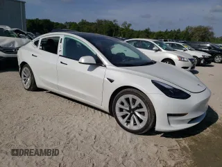 2022 Tesla Model 3 with VIN 5YJ3E1EA0NF320658, listed as a Copart auction lot 53317305 with 27,839 mi miles and Non Repairable. Bid and sale history available at carsss.com. Image 4.