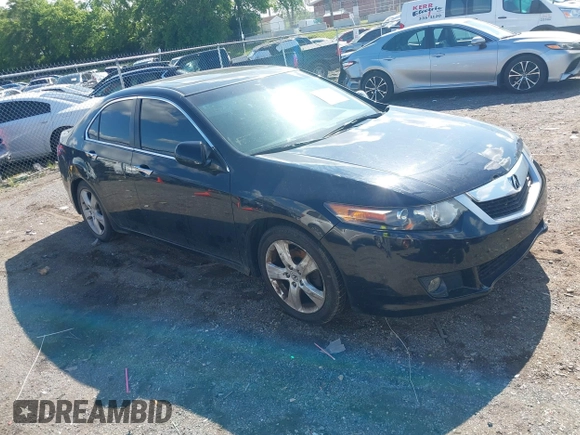 2009 Acura TSX with VIN JH4CU26659C011482, listed as a IAAI auction lot 42212079 with 243,119 mi miles. Bid and sale history available at carsss.com. Image 1.