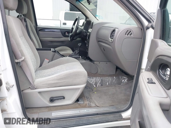 2005 GMC Envoy SLE z VIN 1GKDT13S652279384, wystawiony jako IAAI lot #42208597 z przebiegiem 147 036 mil mil oraz . Historia ofert i sprzedaży dostępna na DreamBid. Obrazek 5.