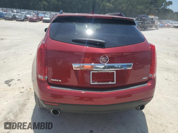 2012 Cadillac SRX Premium Collection with VIN 3GYFNCE39CS518034, listed as a Copart auction lot 65373925 with 50,684 mi miles and Salvage title. Bid and sale history available at DreamBid. Image 6.