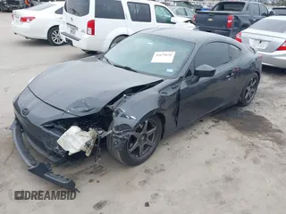 2016 Scion FR-S with VIN JF1ZNAA15G8708350, listed as a IAAI auction lot 41679656 with 111,245 mi miles. Bid and sale history available at carsss.com. Image 2.