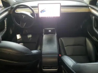 2022 Tesla Model 3 with VIN 5YJ3E1EA7NF369551, listed as a Copart auction lot 55610805 with 128,311 mi miles and Clean Title. Bid and sale history available at DreamBid. Image 8.