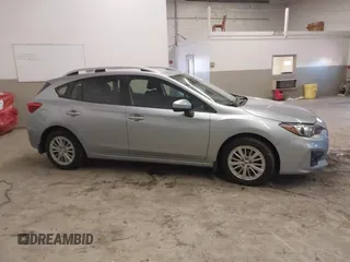 2017 Subaru Impreza Premium z VIN 4S3GTAB63H3705818, wystawiony jako IAAI lot #41568064 z przebiegiem 132 046 mil mil oraz . Historia ofert i sprzedaży dostępna na DreamBid. Obrazek 13.