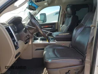 2012 Ram 2500 Laramie Limited z VIN 3C6UD5PL5CG173734, wystawiony jako Copart lot #56576995 z przebiegiem 296 460 mil mil oraz Czysty tytuł • Clean title. Historia ofert i sprzedaży dostępna na DreamBid. Obrazek 7.
